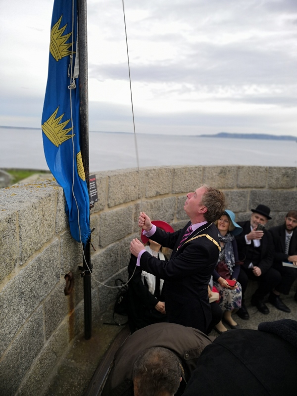 Cathaoirleach raises the flag for Joyce Tower Bloomsday Celebrations